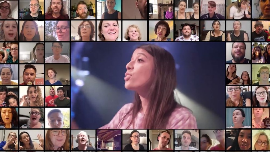 Screen shot of people singing.