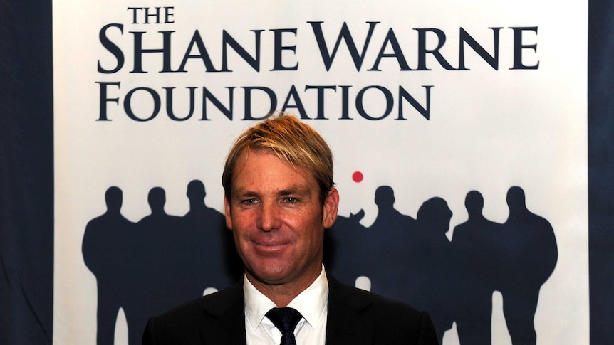 Shane Warne at an event for his foundation