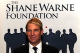 Shane Warne at an event for his foundation