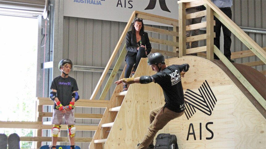 Surf champion Layne Beachley watches on at the Surfing Australia skateboard facility
