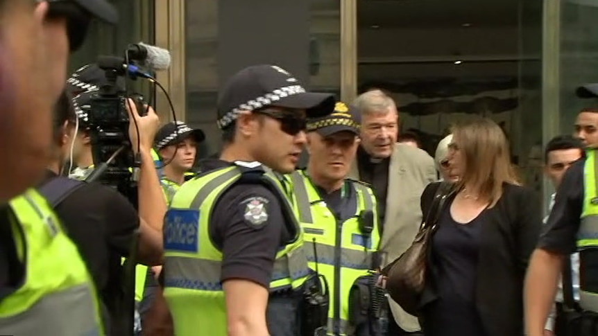 George Pell leaves court after suppression is lifted