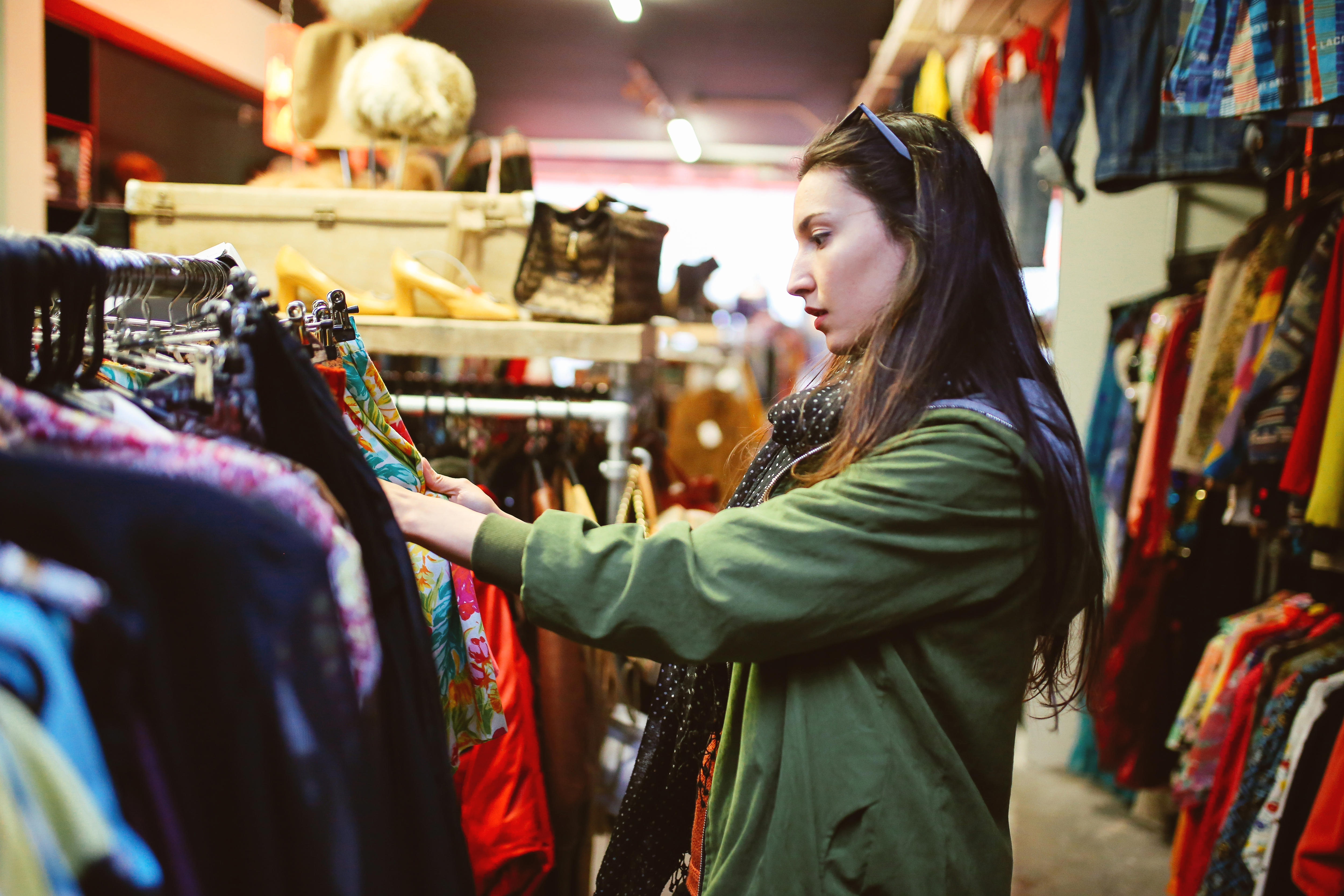 A young woman in a second-hand shop