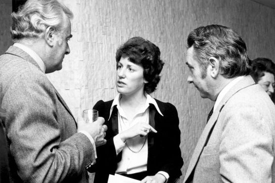 Elizabeth  Reid talking with Gough Whitlam