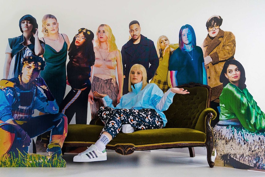 Alice Ivy with cardboard cut-outs of her 2020 album collaborators
