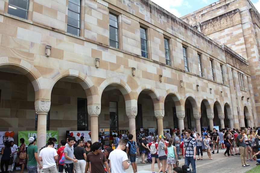 Thousands of students flock to University of Queensland's Great Court during Orientation Week.