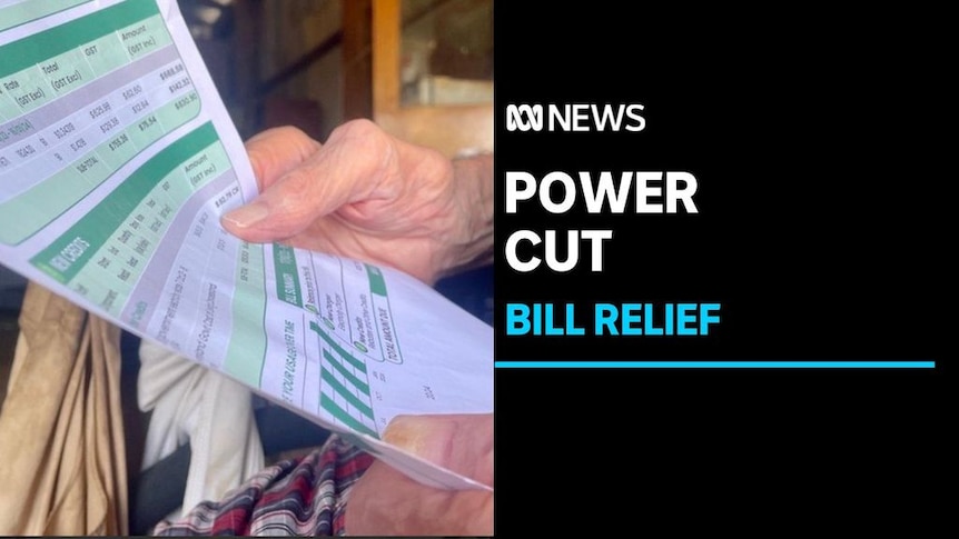 Power Cut, Bill Relief: Close up of someone holding an energy bill.