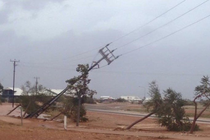 Leaning power lines after Cyclone Olwyn