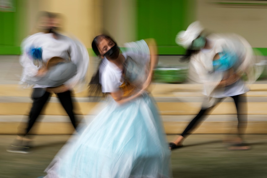 Woman performs with a dance company in the Philippines.