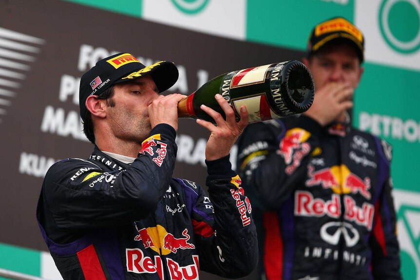 Webber swigs second-place champagne