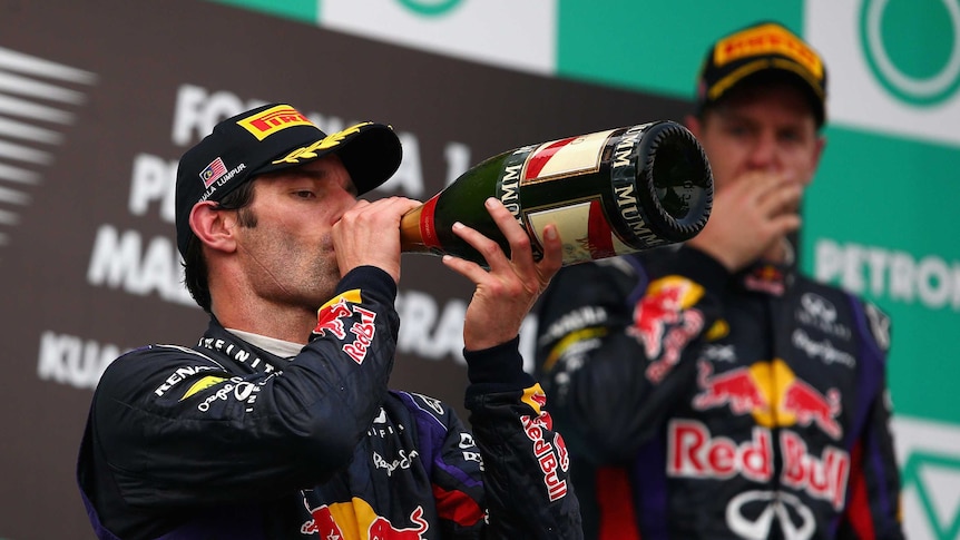 Webber swigs second-place champagne