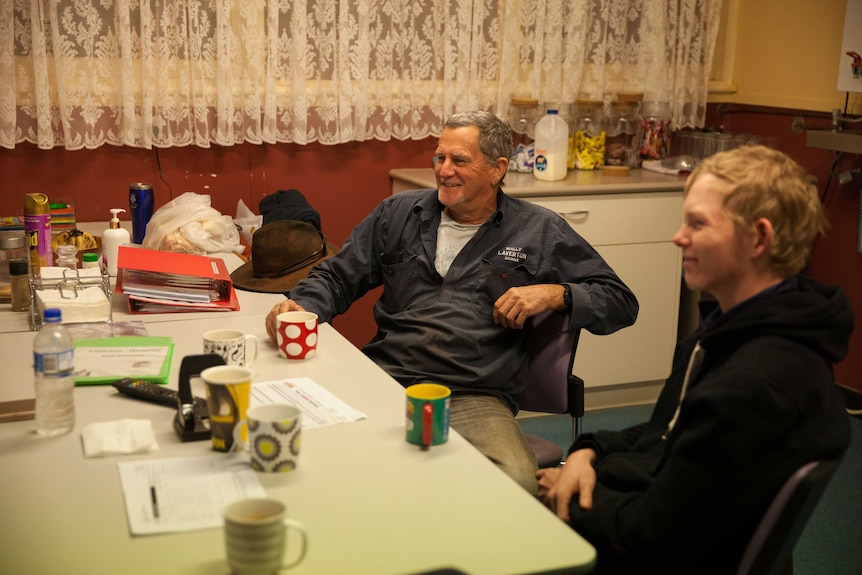 Wally Van Dam and his step-son Nathan enjoy a cup of tea at the hospital in Laverton, WA.