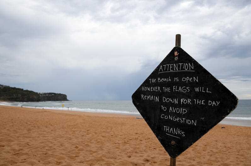 A sign at Newport Beach advising of closure.