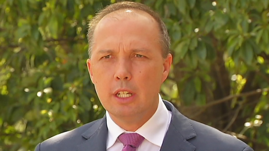 Immigration Minister Peter Dutton speaking to the media in Brisbane