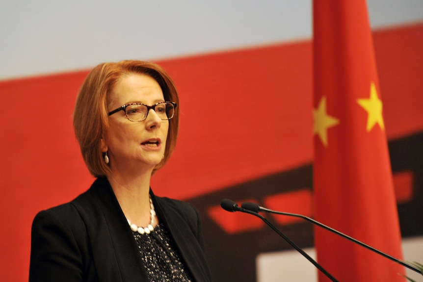Prime Minister Julia Gillard speaks to the media in Shanghai on Monday, April 8, 2013