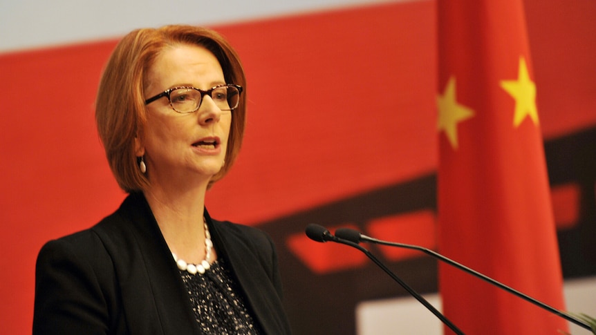 Prime Minister Julia Gillard speaks to the media in Shanghai on Monday, April 8, 2013