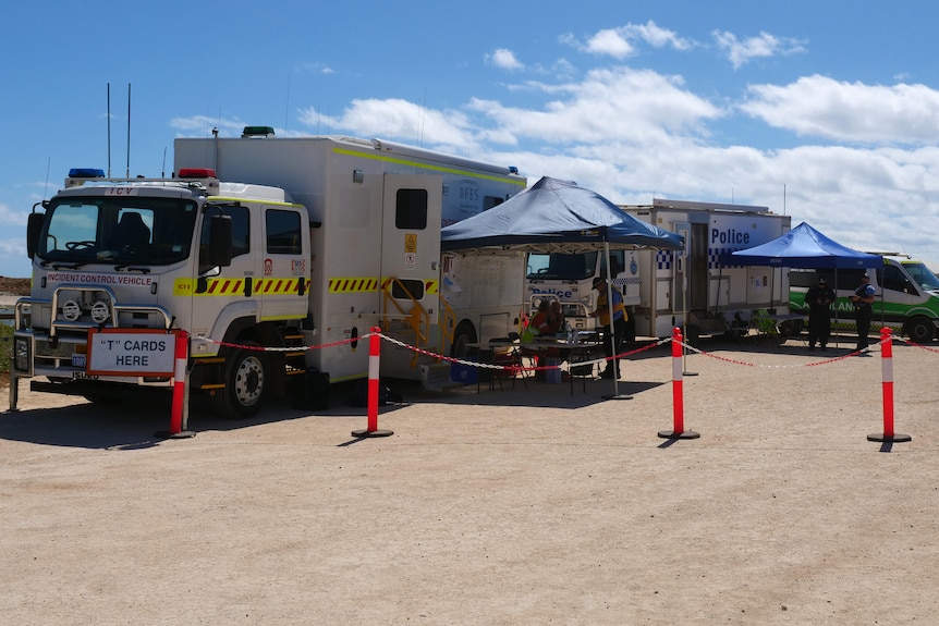 Emergency services vehicles parked at Cleo Smith search site