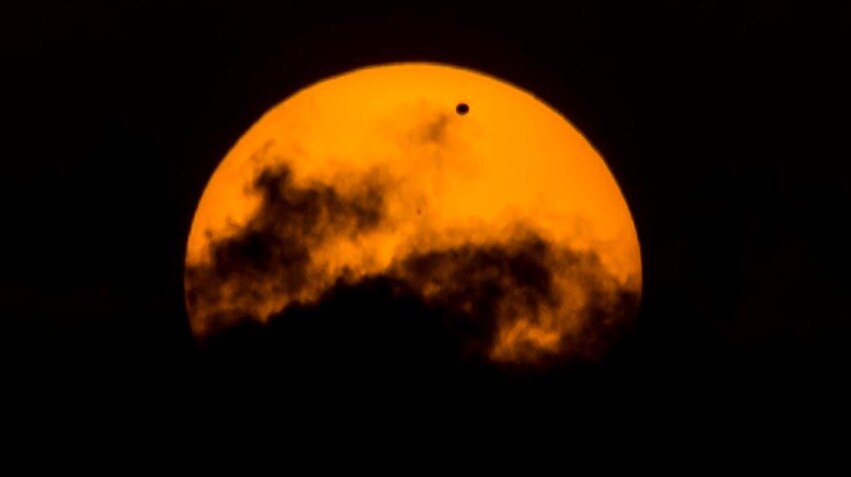 Venus transits the Sun, as seen from Italy.