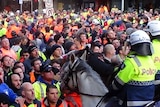 Construction workers clash with police at the Grocon building site in Lonsdale Street in Melbourne.