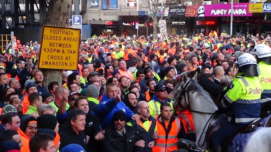 Construction workers clash with police at the Grocon building site in Lonsdale Street in Melbourne.