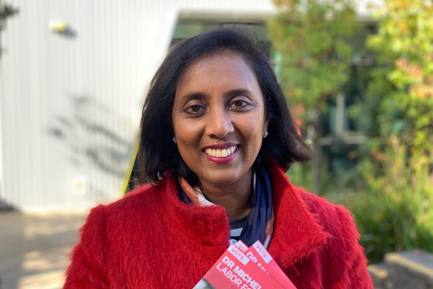 Labor candidate for Higgins Michelle Ananda-Rajah smiles at the camera.