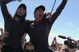 James Castrission and Justin Jones celebrate after kayaking the Tasman