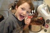 Matt Cook making a cake as a child for a story about the benefits of teaching kids to cook from a young age