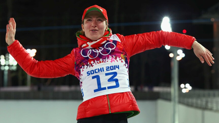 Domracheva celebrates with biathlon gold