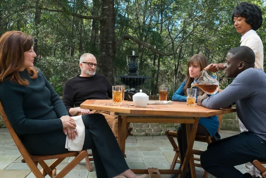 Chris Washington, played by Daniel Kaluuya, meets the parents in a scene from Get Out.