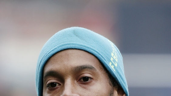 Ronaldinho leaves the pitch at a Barcelona training session