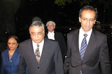 Jayant Patel (c) arrives at the Brisbane Supreme Court with his wife Kishoree