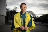 Man smiling for a photo after being selected to compete for Australia at the Tokyo Olympic Games for diving