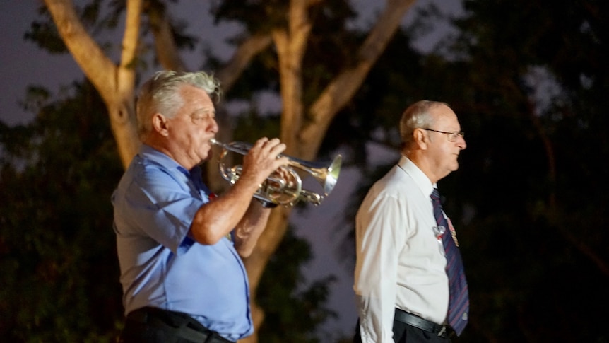 Bill Buckley plays the bugle at a Darwin dawn service in 2020.