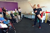 Seniors from Tasmanian Coroneagh Park nursing home watch circus performers.