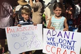 Kobi and Cleo Condon with their grandmother at the Adani protest.