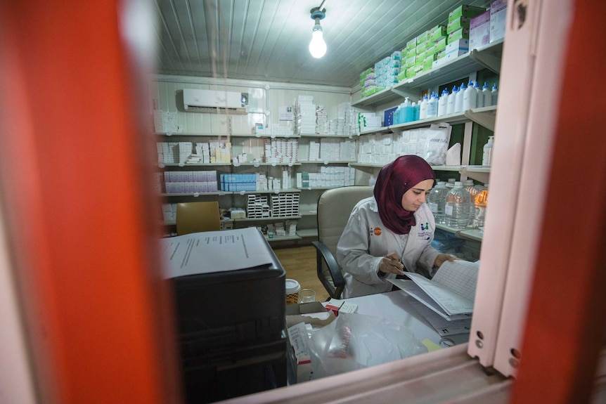 A doctor works in the maternity clinic in Zaatari refugee camp in Jordan.