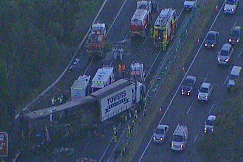 A family of three has been killed in a fiery crash with a truck north of Sydney.