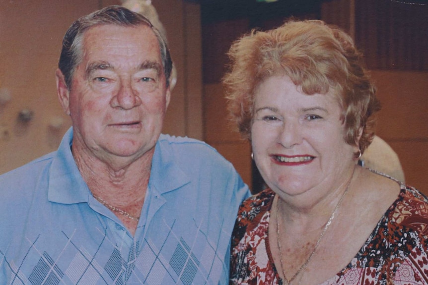 Graeme and Karla Lake stand next to each other smiling.