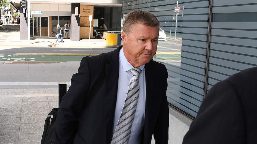 Dave Hanna arrives at the District Court in Brisbane.