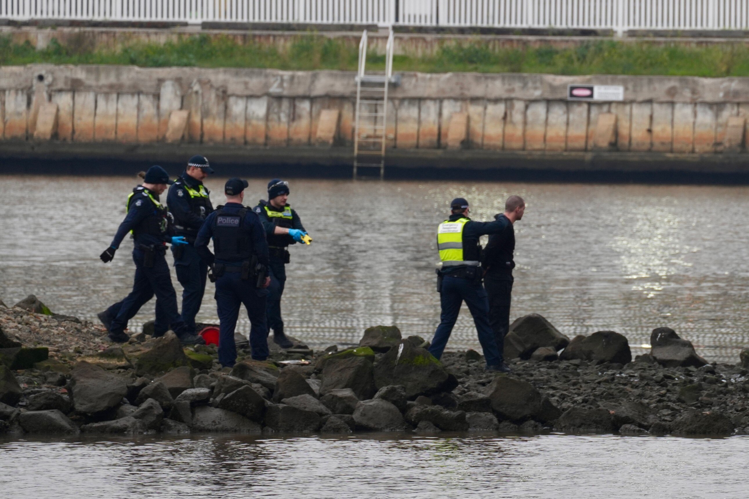 A man being arrested by police