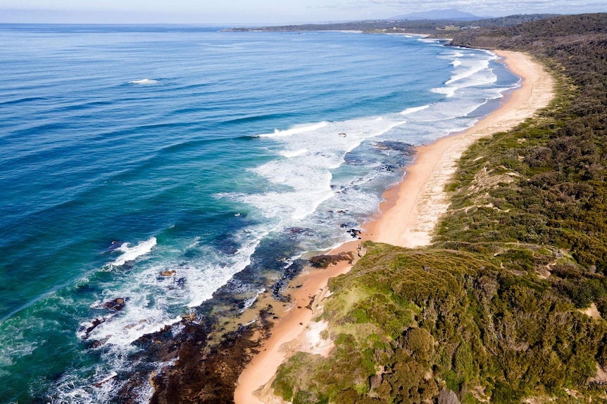 A drone shot of a stretch of coastline on a stunning clear day. Ausnew Home Care, NDIS registered provider, My Aged Care