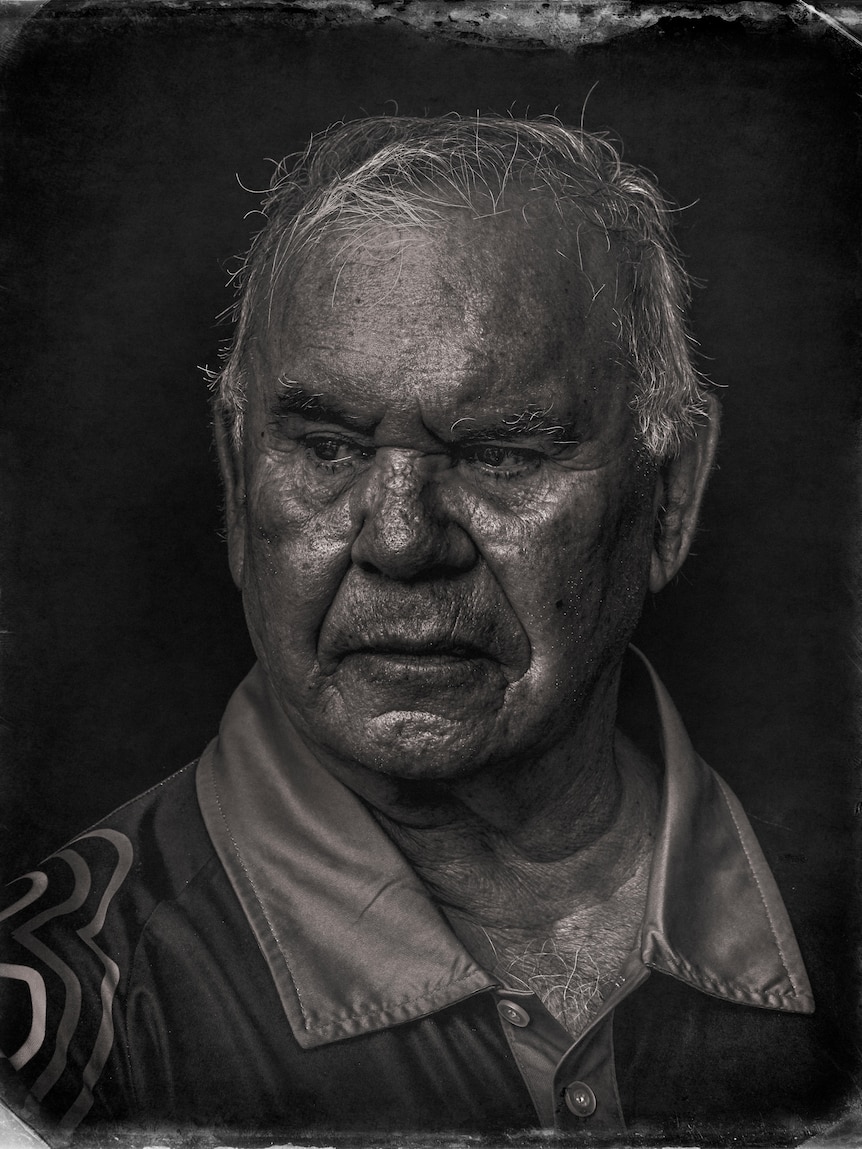 An older Aboriginal man, photographed in black and white.