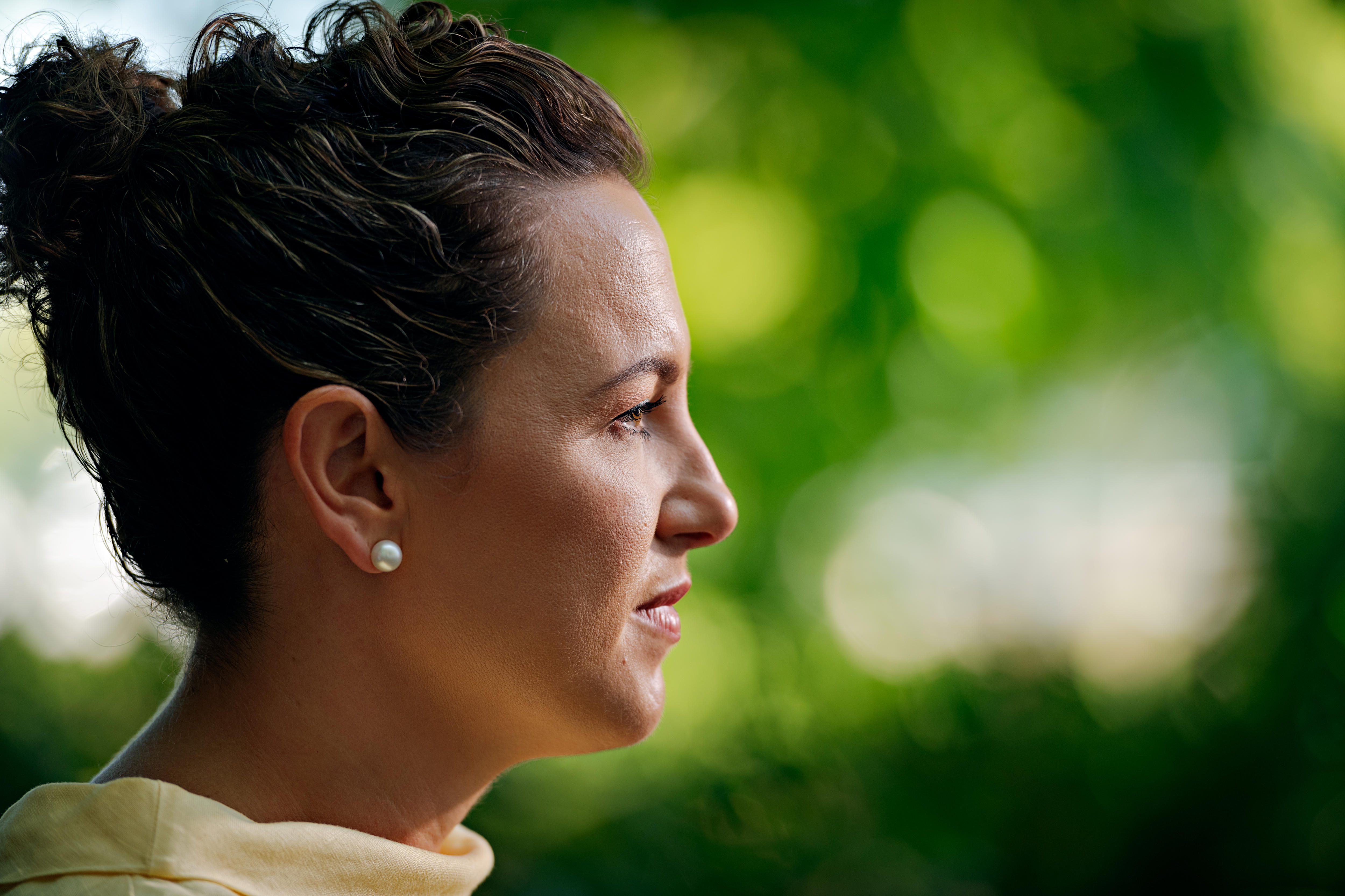 The side of a womans face. 