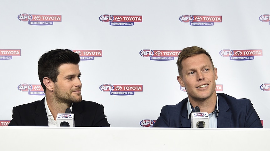 Shared honour ... Trent Cotchin (L) and Sam Mitchell speak to the media on Thursday
