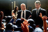 New South Wales Premier Mike Baird (right) and Minister for Education Adrian Piccoli in a crowd of students