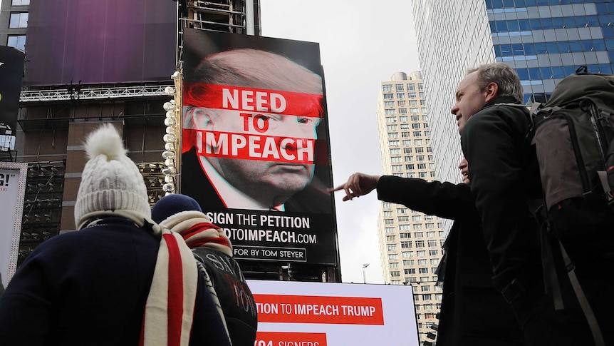 A billboard in Times Square, funded by Philanthropist Tom Steyer, calls for the impeachment of President Donald Trump.