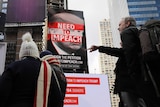 A billboard in Times Square, funded by Philanthropist Tom Steyer, calls for the impeachment of President Donald Trump.