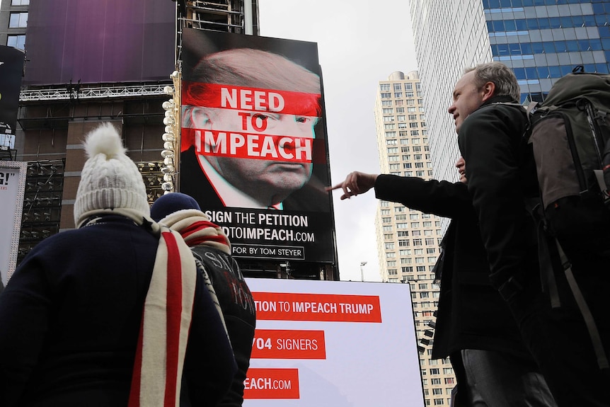 A billboard in Times Square, funded by Philanthropist Tom Steyer, calls for the impeachment of President Donald Trump.