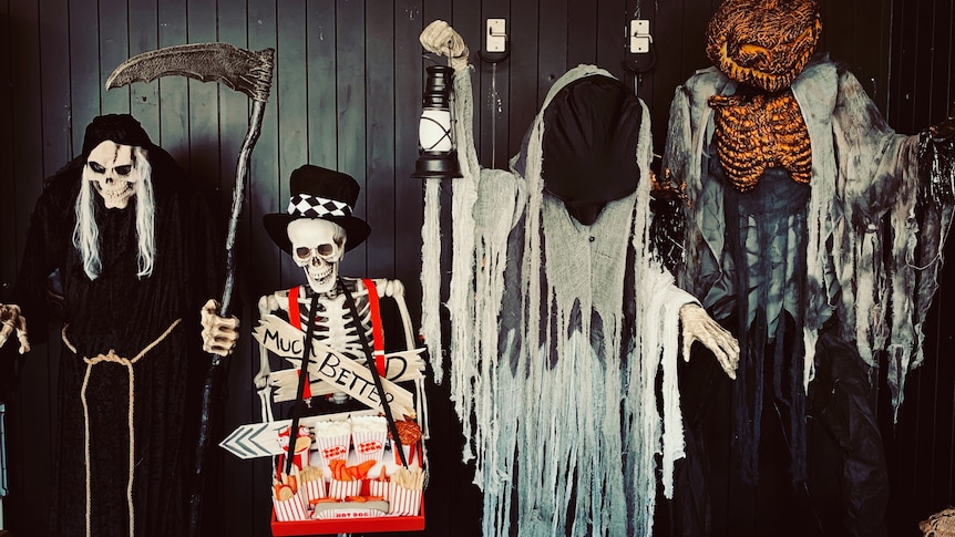 Halloween skeletons and grim reapers