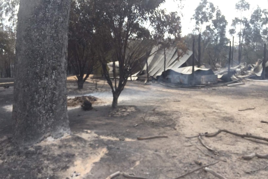 Rubble of burnt out home