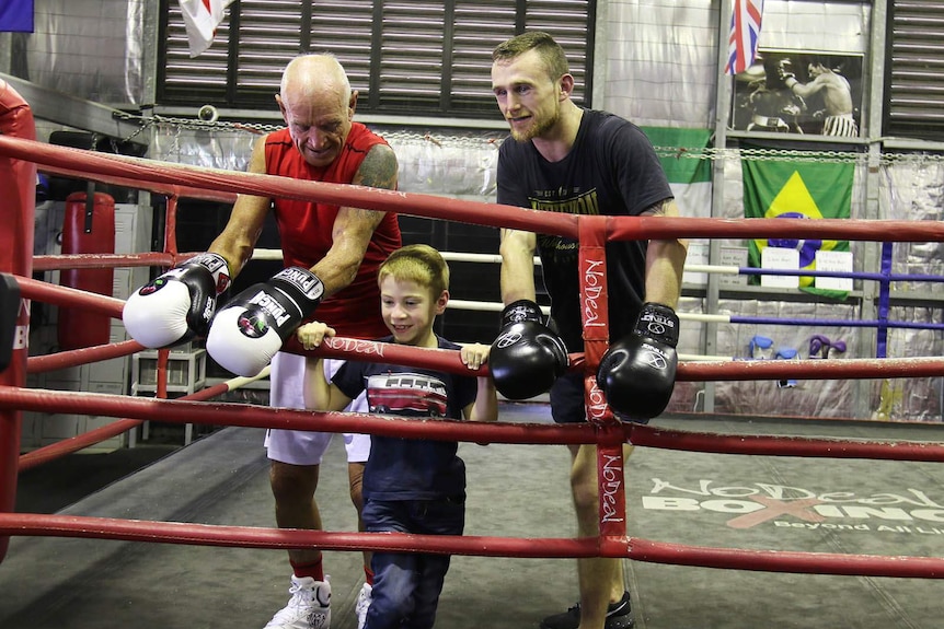 Dennis Cherry, seven-year-old Sean Senbel-Lynch and Dennis Hogan